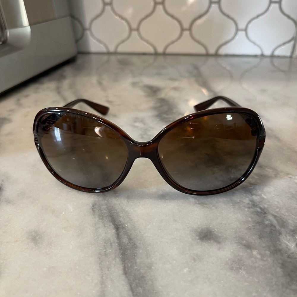 Sunglasses from sunglass hut. Made in Italy. Polarized